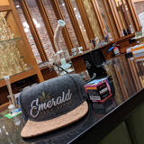 Emerald Farm Tours swag on display at the dab bar inside Moe Greens Lounge